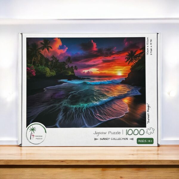 A 1000-piece jigsaw puzzle box displaying a vibrant sunset over an ocean with waves and palm trees. The puzzle is part of the "Sunset Collection" and is suitable for ages 14 and up.